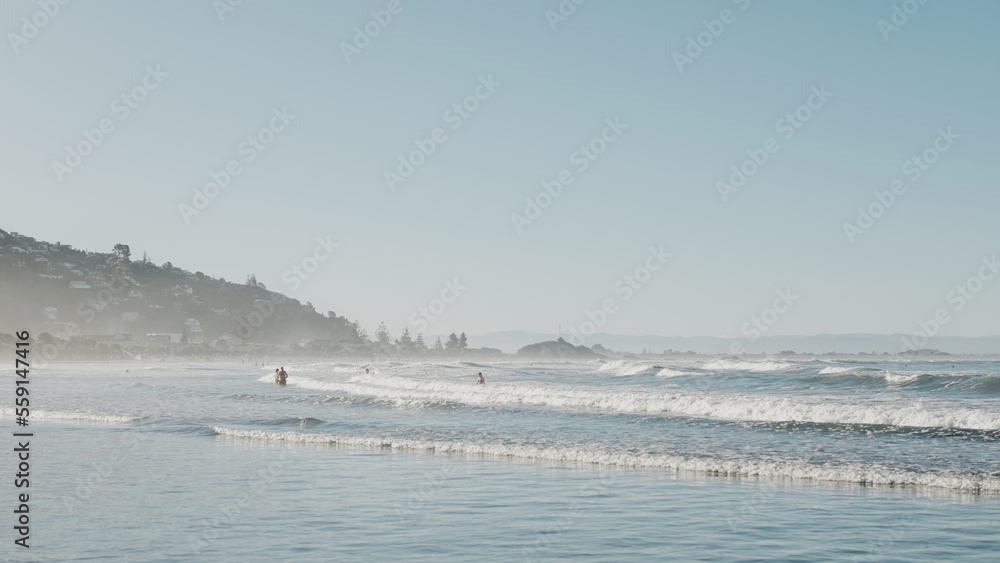 Pacific Ocean coast in New Zealand. The concept of local travel, walking on the street, traveling. Pacific Ocean coast in New Zealand. The concept of local travel, walking on the street, traveling.