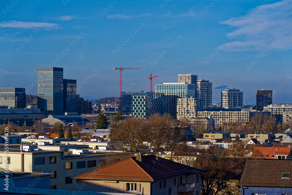 Modern skyline of City of Zürich North with skyscrapers and cranes on a sunny winter day. Photo taken January 7th, 2023, Zurich, Switzerland.