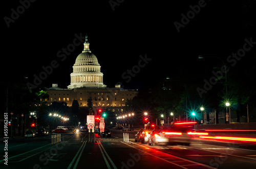 Fototapeta Naklejka Na Ścianę i Meble -  US Capitol building and car light trails at night - Washington DC, United States