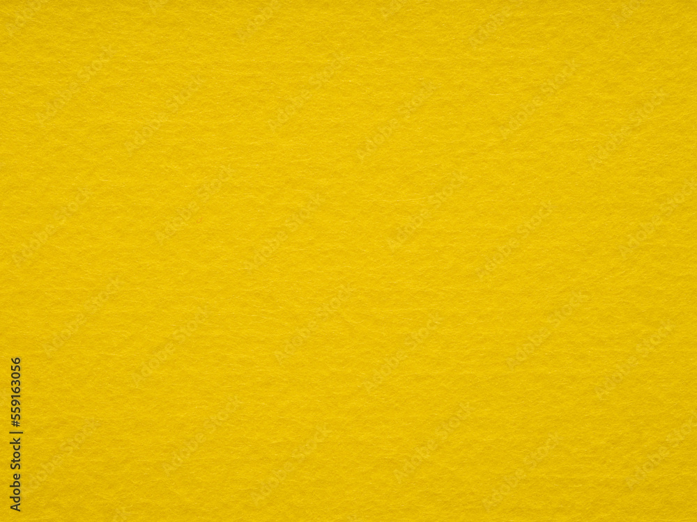 Texture of yellow, felt close-up. Handicraft concept, crafts, DIY, do it yourself. Top view, flat lay, layout, place for text. For shops with goods for creativity patchwork or art work. Texture of yellow, felt close-up. Handicraft concept, crafts, DIY, do it yourself. Top view, flat lay, layout, place for text. For shops with goods for creativity patchwork or art work.