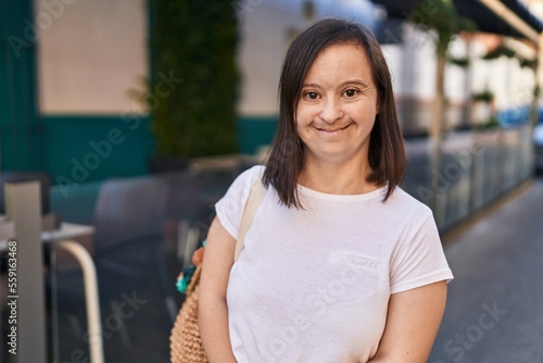 Down syndrome woman smiling confident standing at street Free Download Down syndrome woman smiling confident standing at street - GFXLoad