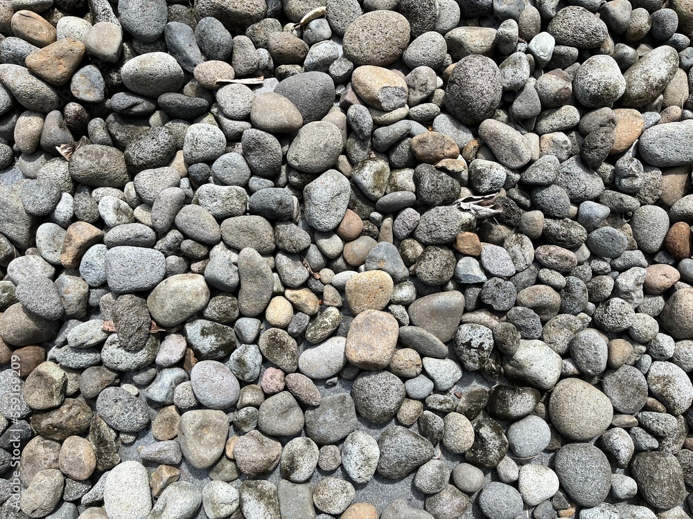 Background and texture of stone pebbles in the garden for decoration. Background and texture of stone pebbles in the garden for decoration.