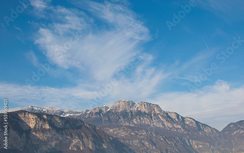 Clouds in the sky above the mountains of the Trentino area, Italy.