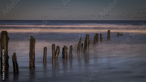 Groynes on the beach at Sandsend in North Yorkshire © Andrew