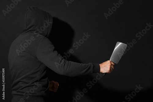 Maniac with cleaver on blac...