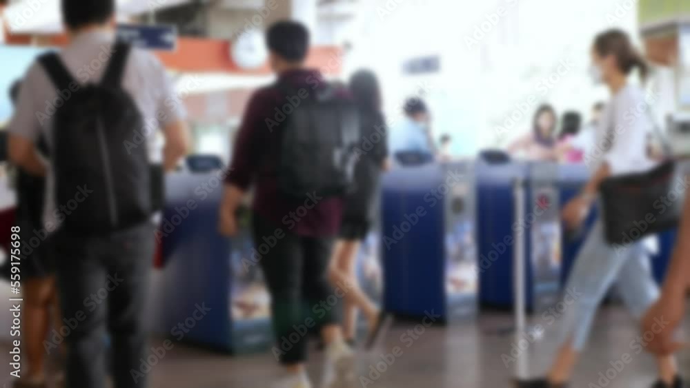 defocused blurred crowd of people moving travel on the transition to the metro, defocused blurred background, public transportation