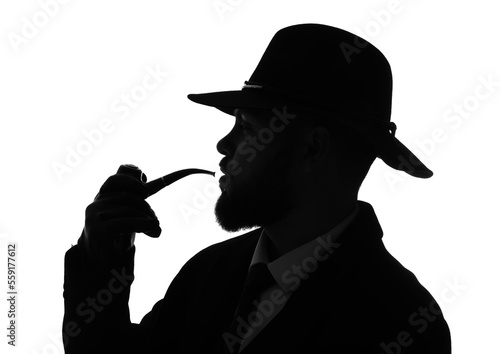 Silhouette of young man wit...