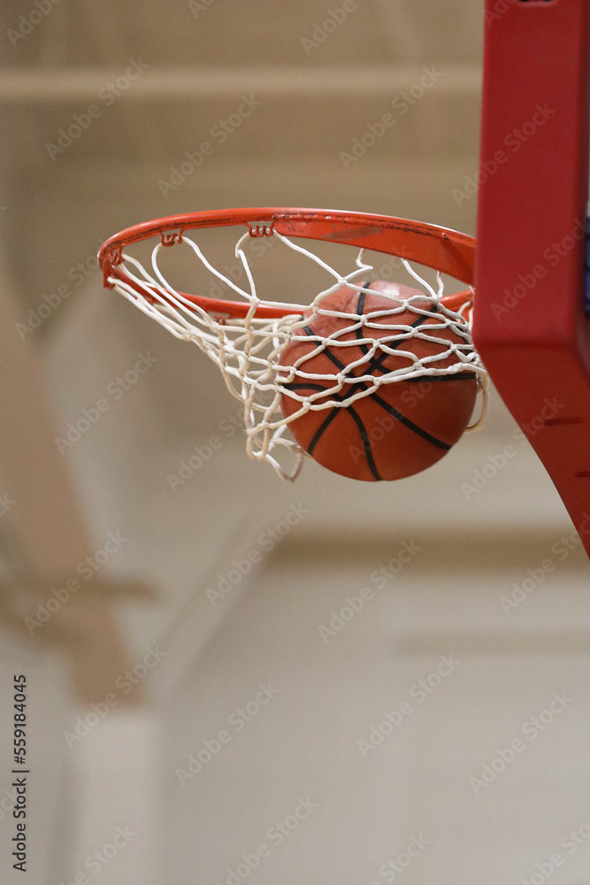 scoring basketball swishing the net