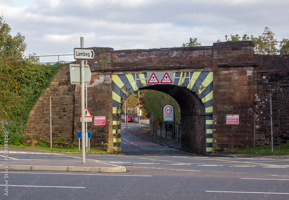 Naklejka premium The old stone railway bridge at the junction on the A1 and The Moss Road near lisburn in County Down Northern Ireland