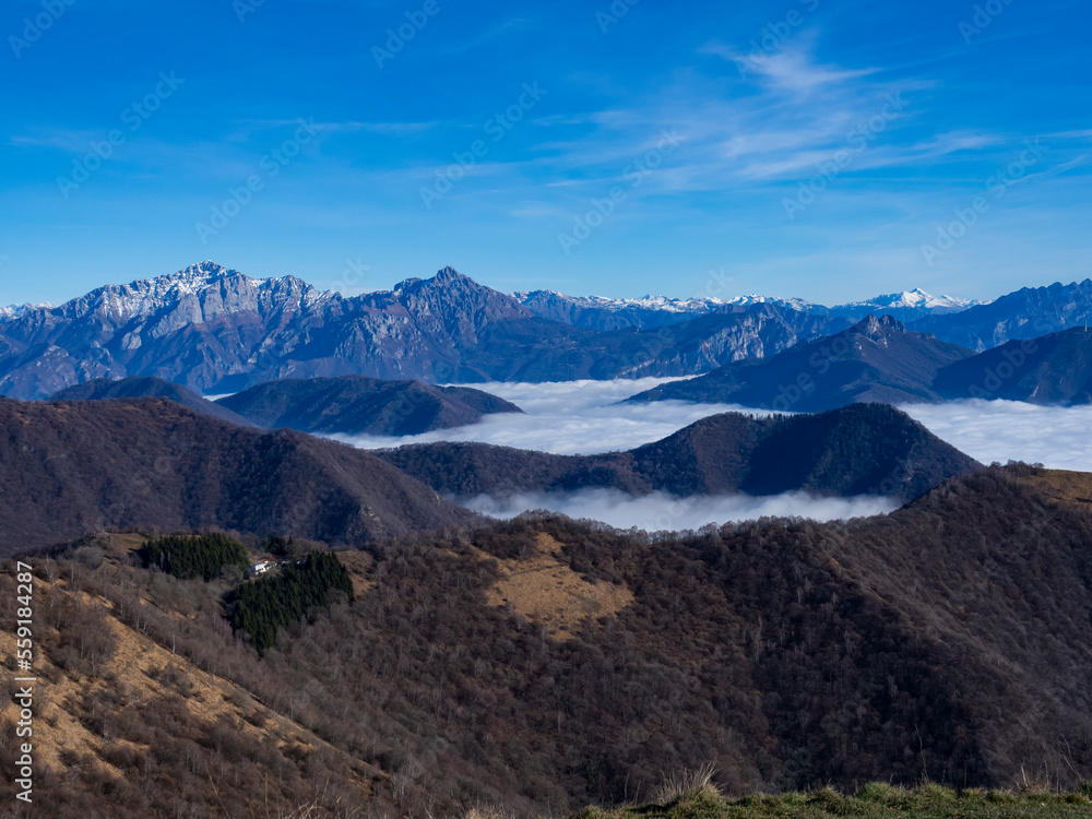 Clouds on the valley floor of Lake Como and Brianza viewed from Mount Puscio Clouds on the valley floor of Lake Como and Brianza viewed from Mount Puscio
