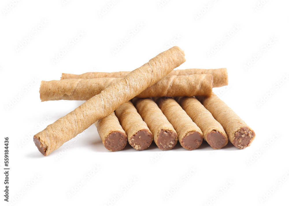 Tasty wafer rolls with boiled condensed milk isolated on white background