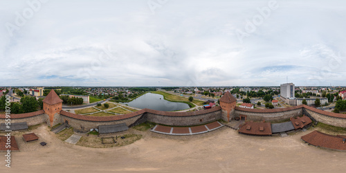 aerial full seamless spherical hdri 360 panorama view above over a medieval castle and historic buildings in equirectangular projection.
