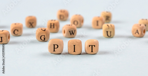 Wallpaper Mural PIT written on a wooden cube , business concept Torontodigital.ca