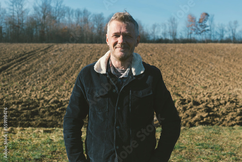 Small business agriculture. Farmer at his plowed agricultural field. © Jelena