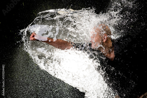 punching a water balloon