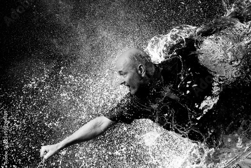 punching a water balloon