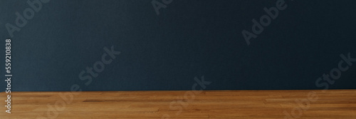 Banner with dark blue background for copy space and wooden table