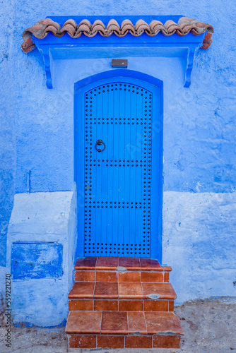 Blue Door in chefchaouen city © Sam