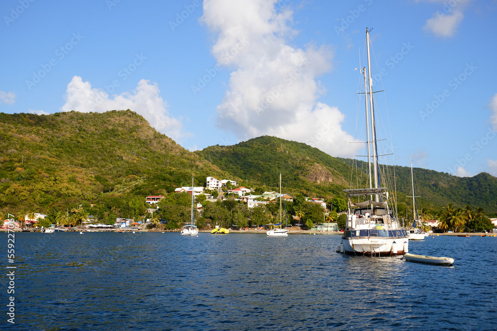 yachts at anchorage, caribbean sea, turquoise water, snow-white yachts in Martinique