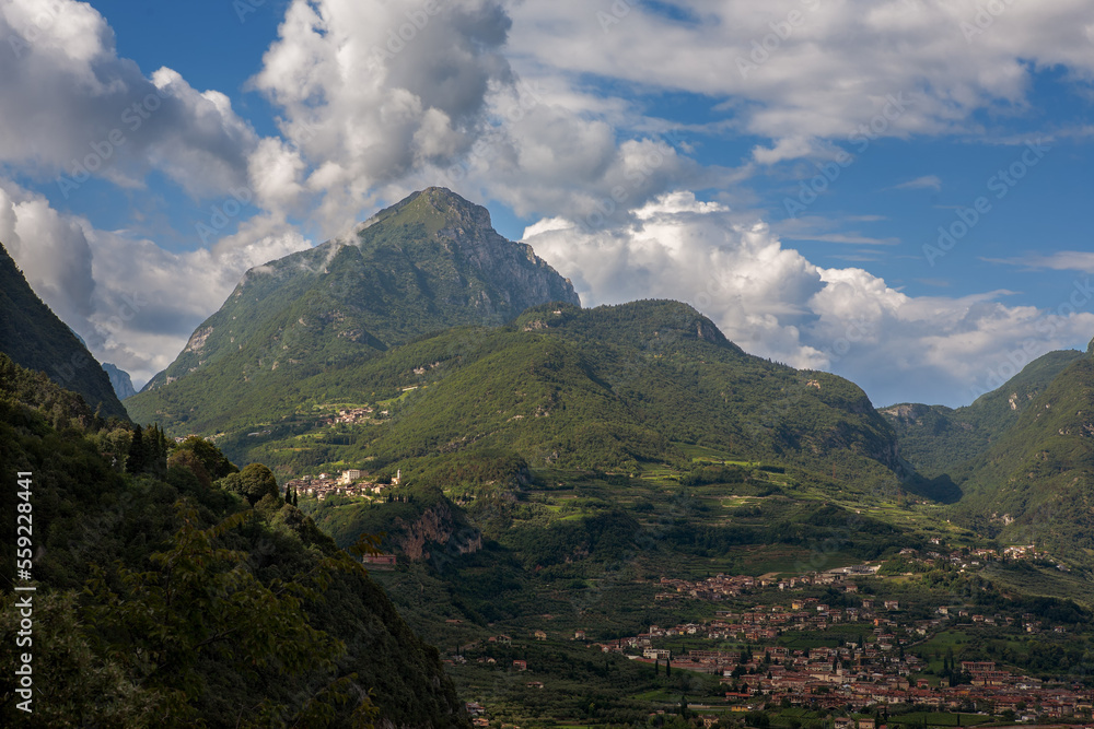 Fototapeta premium Monte Misone is a solitary peak on the north-west end of Lake Garda. It lies behind Riva del Garda, here seen from the path up to the Bastione (Strada Santa Maria Maddalena), Trento, Italy