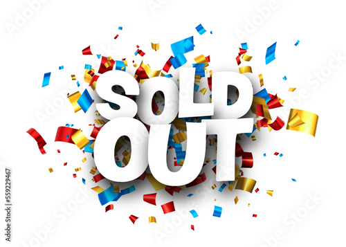 Sold out sign over colorful cut out foil ribbon confetti background.