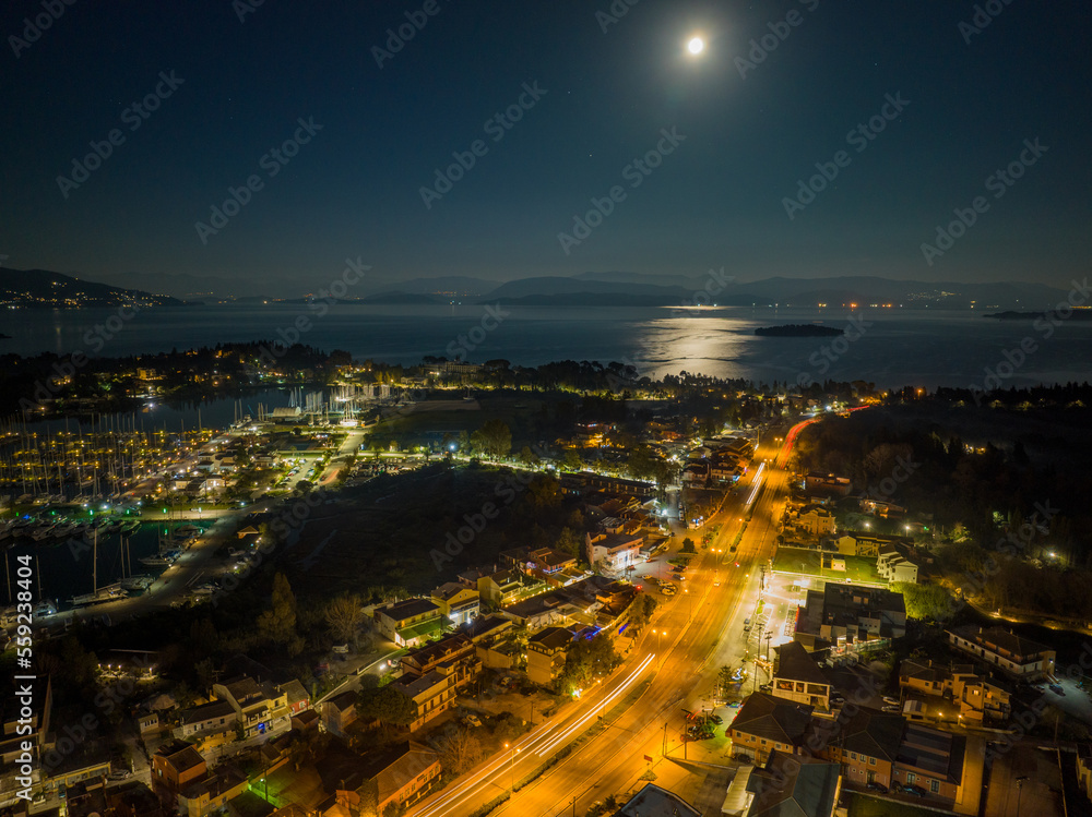 Aerial drone view of corfu island with full moon in Greece