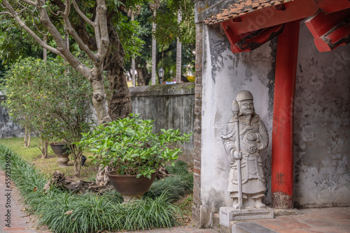 In Hanoi, Vietnam, an old stone statue at the Temple of Literature. photo