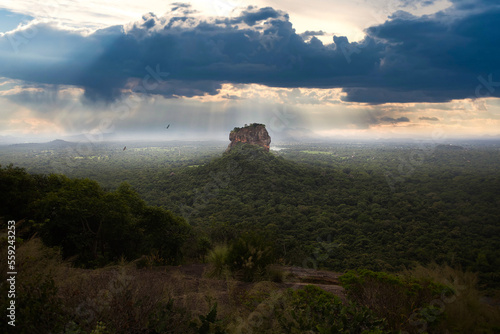 View from Pidurangala mountain to Sigiriya Lion Rock in Sri Lanka. Landscape panorama. After climb up the hill for tourists for wonderful view point to Lion Rock.