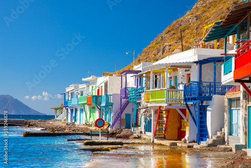 Vibrant fishing village of Klima with white houses and colorful doors on Milos Island in Greece photo