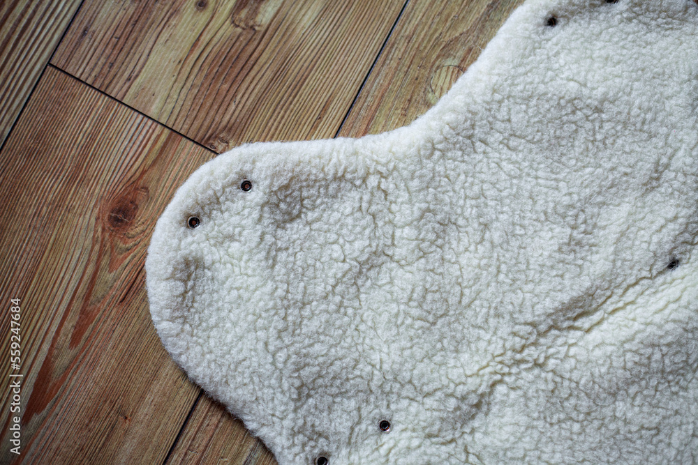 Fototapeta premium Detailed photo of a original sheep wool handmuff