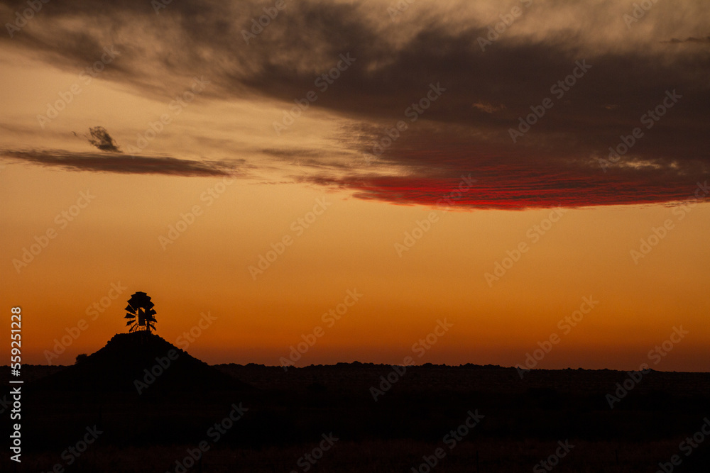 Namibian windmill at sunset 