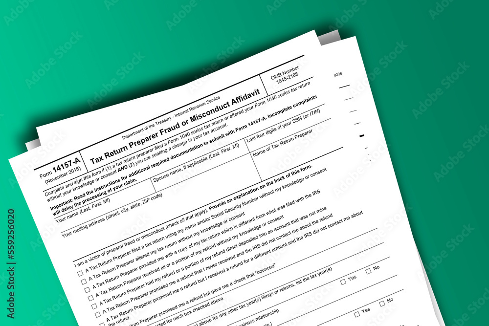 Form 14157-A documentation published IRS USA 43446. American tax document on colored Form 14157-A documentation published IRS USA 43446. American tax document on colored