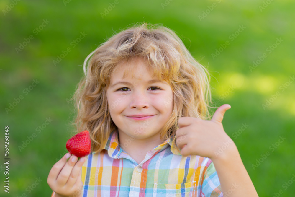 Kid picking and eating ripe strawberry. Happy child holding fresh fruits berry strawberry. Healthy organic berry strawberries fruit, summer season. Kid picking and eating ripe strawberry. Happy child holding fresh fruits berry strawberry. Healthy organic berry strawberries fruit, summer season.