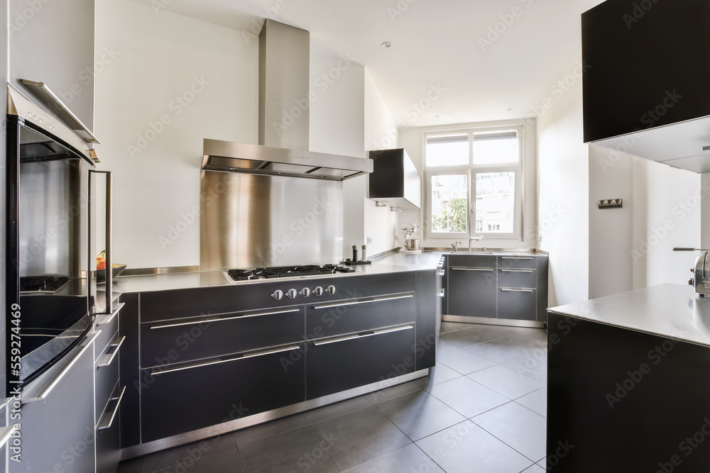 Modern Appliances In New Kitchen Apartment Stock Photo