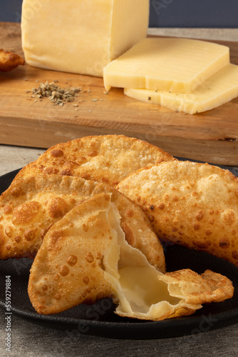Brazilian snack pastel of cheese.