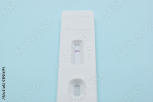 covid test kit on blue background