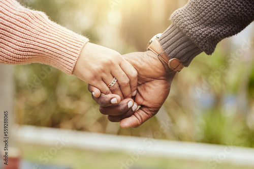 Love, support and trust hands of black couple in marriage together with care, romance and unity. Soulmate, married and man with woman holding hands for romantic bonding moment in nature zoom.