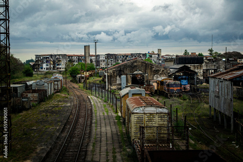 Abandoned train station with buildings in the background  © JuanCruz20