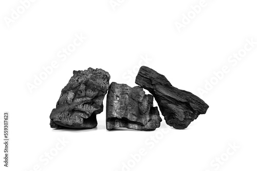 Close up pile of coals or black charcoal stack isolate on white background