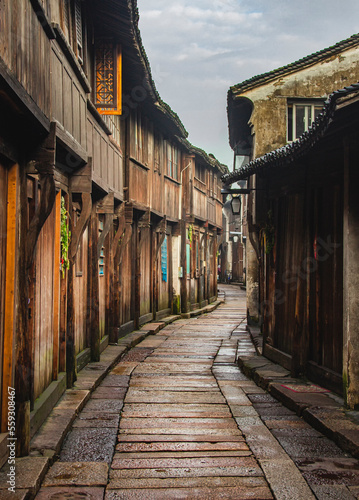 Narrow alley and historical Chinese townhouses in Wuzhen at dawn