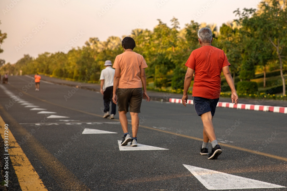 Senior people  exercise walking  at public park healthy  lifestyle  concept.