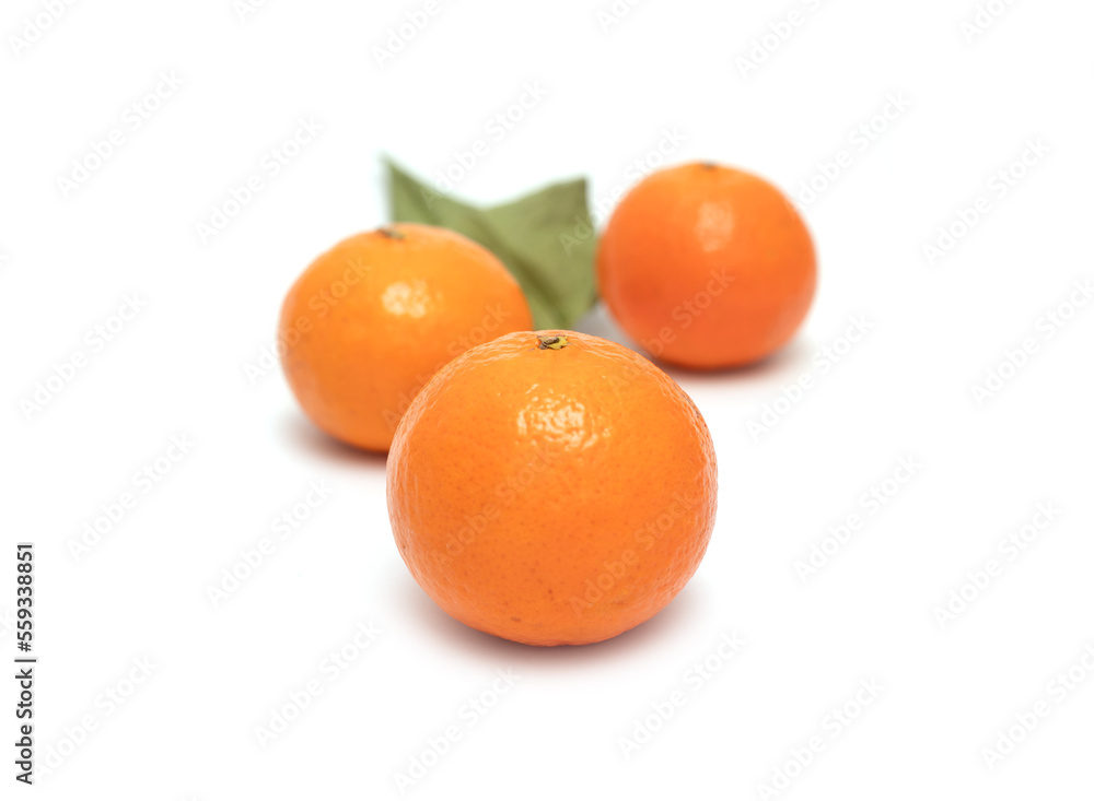 Ripe yellow tangerines on a white background. Ripe yellow tangerines on a white background.