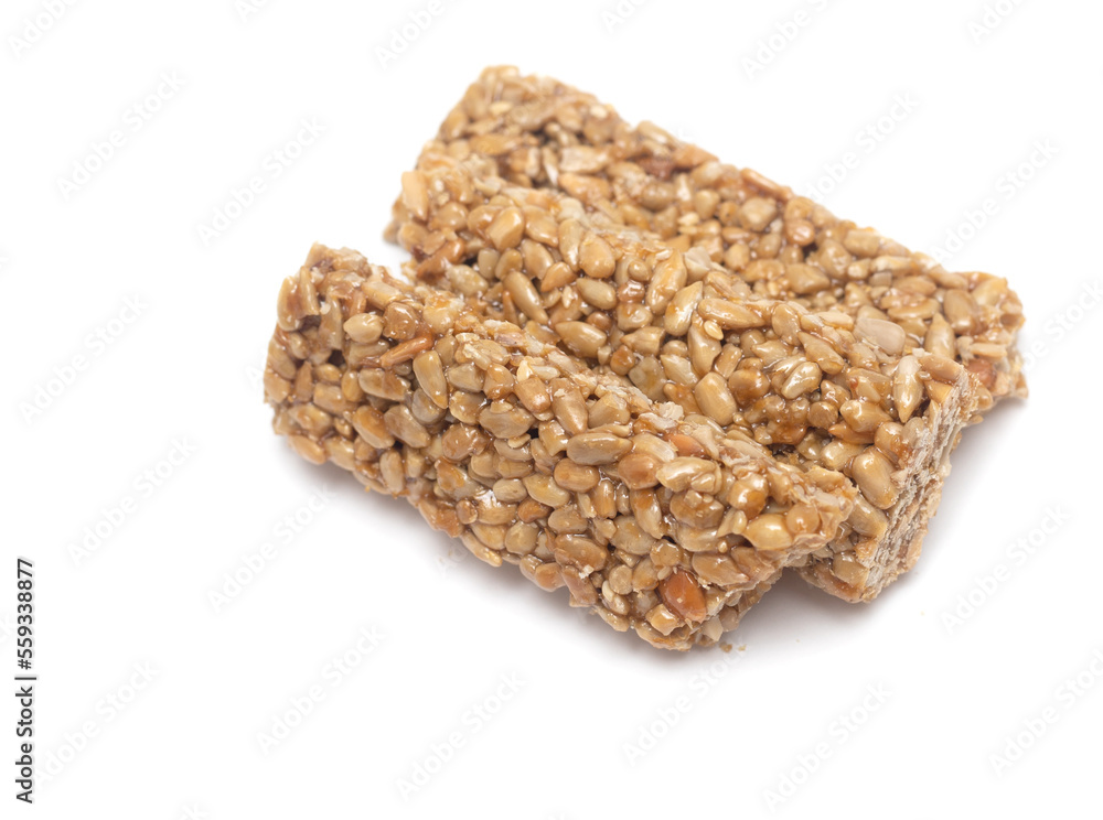 Kozinak from seeds on a white background. Kozinak from seeds on a white background.