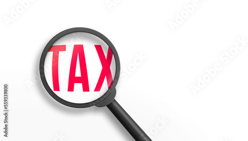 Magnifying Glass over the word tax. 3D illustration.