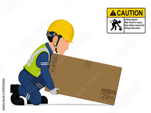 A worker is lifting a big box on the floor