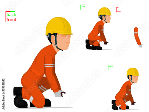 A worker is lifting something on the floor