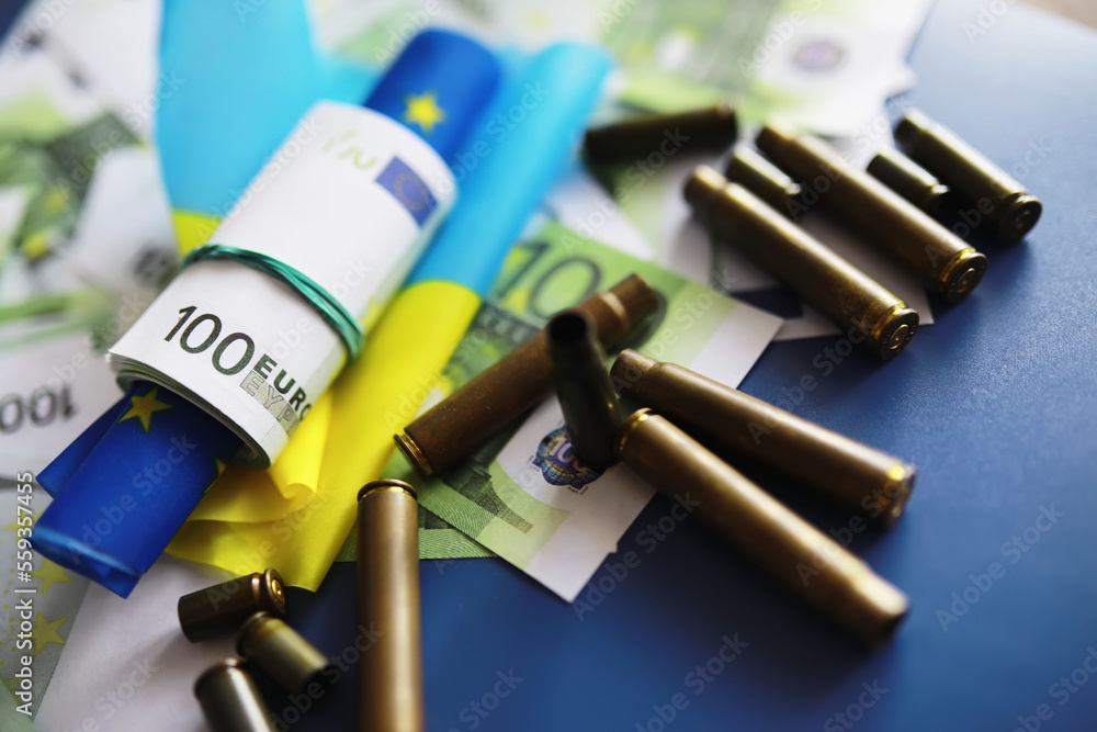 Naklejka premium The concept of European Union support for Ukraine in a military conflict. Solidarity. Politics. Flags are on the table.