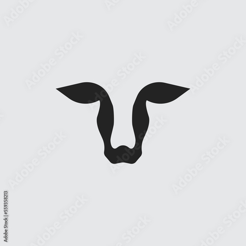 Negative space cow black and white logo