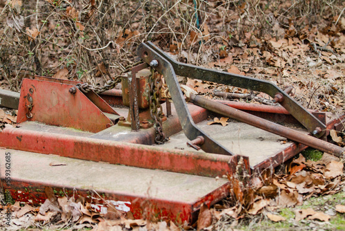 Canvas Print Farm implement, antique old farm equipment rusting on a farm
