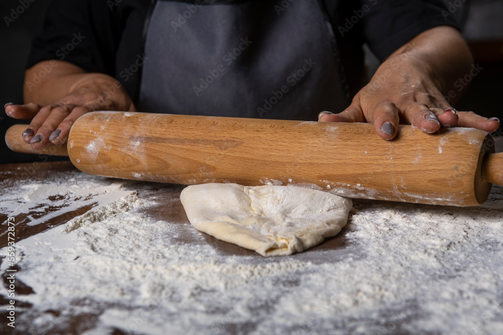 chef making dough with flour and herbs chef making dough with flour and herbs